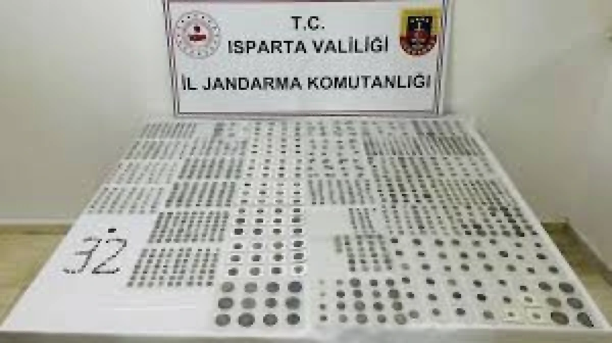 Isparta'da Tarihi Eser Kaçakçılığı Operasyonu: 1.155 Sikke Ele Geçirildi